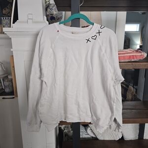 White Sweatshirt with Black and Red Accents